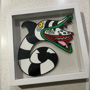 Framed Beetlejuice artwork